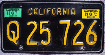 black commercial plate with large-serif Q