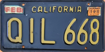 black passenger plate with small-serif Q