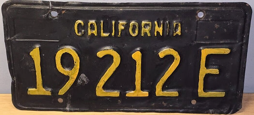 Black commercial plate with letter at the end
