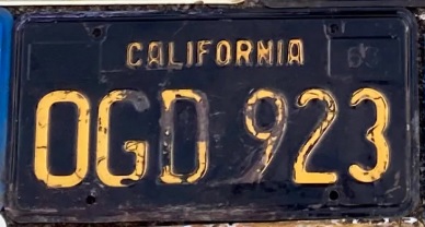 black passenger plate with rounded rectangle O, OGD 923